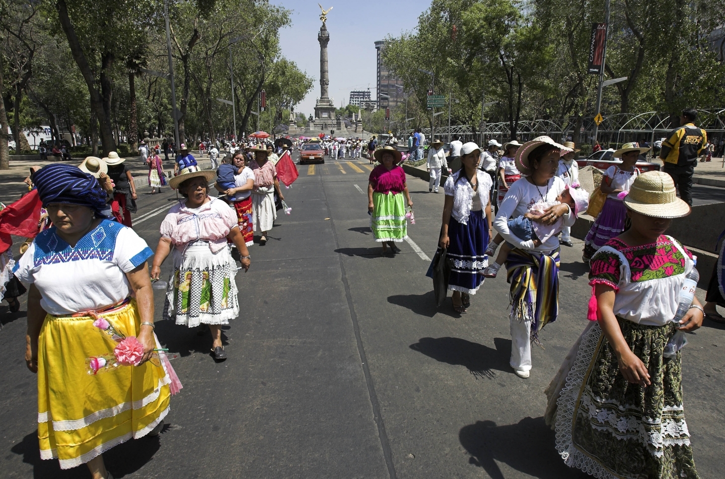 Women march through Mexico City on International Women's Day. (AP Photo/Gregory Bull)