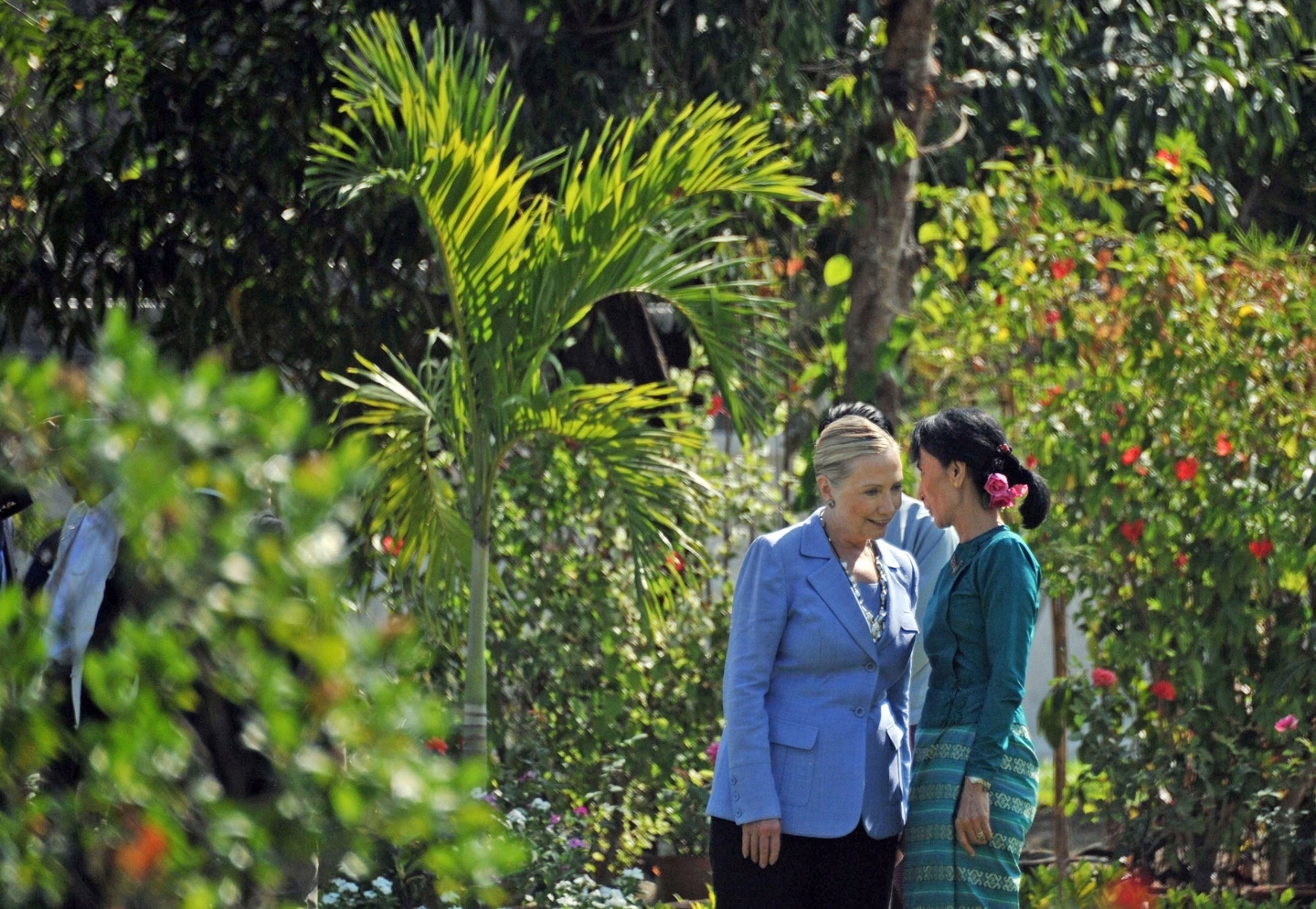 Aung San Suu Kyi, right, talks with visiting U.S. Secretary of State Hillary Clinton at a private residence in Yangon, Myanmar in 2011. (AP Photo/Soe Than Win, Pool)