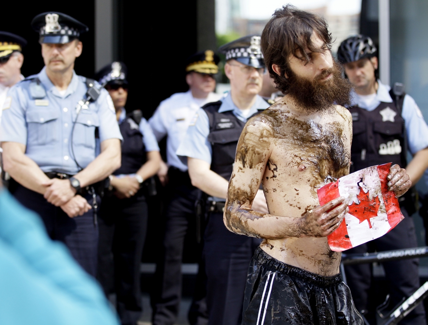 A demonstrator against pipelines at the Canadian Consulate in Chicago (AP Photo/ Nam Y. Huh)