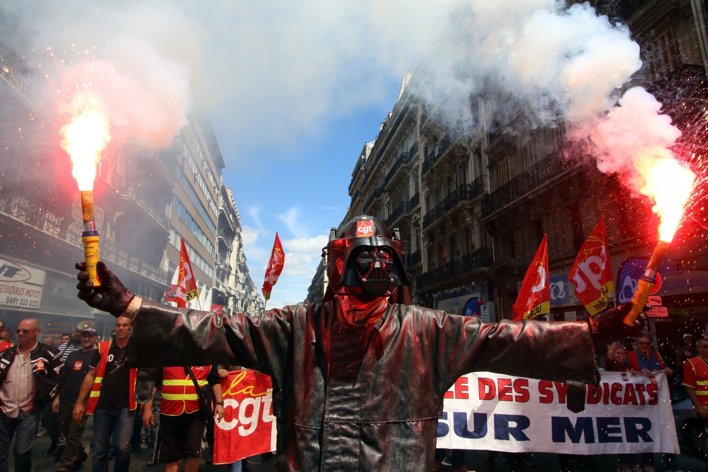 A steelworker in France protests labour reforms