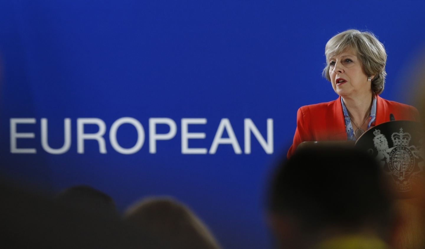 British Prime Minister Theresa May fields questions at an EU Summit in Brussels (AP Photo/Alastair Grant)