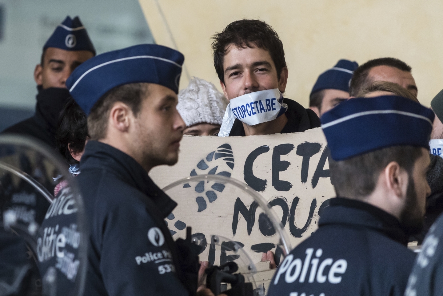 Protestors outside the EU headquarters in Brussels (The Associated Press)