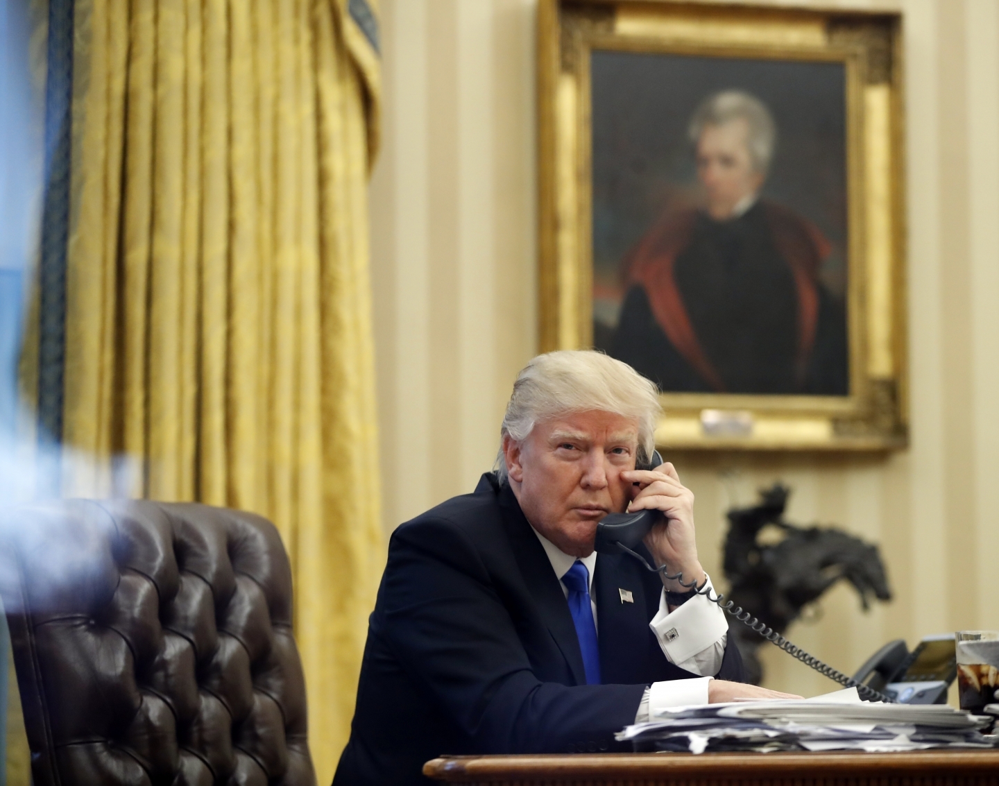 A portrait of Andrew Jackson, former US president, hangs on the wall behind Donald Trump (AP Photo/Alex Brandon)