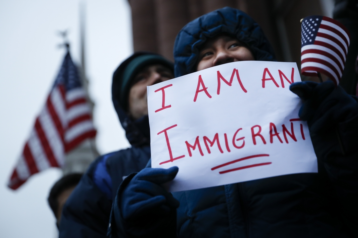 Demonstrators in Cincinnati, where Mayor John Cranley declared a "sanctuary city" (AP Photo/John Minchillo)