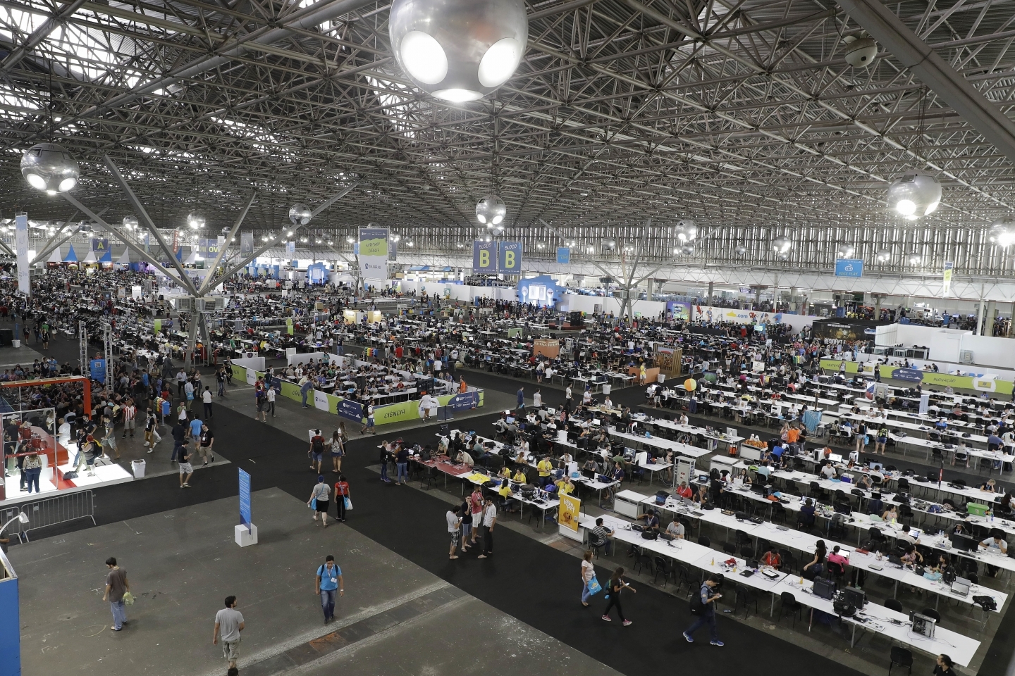 Hackers, developers and technology enthusiasts attend a technology festival in Sao Paulo, Brazil. (AP Photo/Andre Penner)