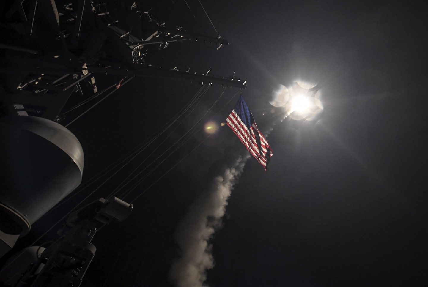 The USS Porter launches a tomahawk land attack missile in the Mediterranean Sea (Mass Communication Specialist 3rd Class Ford Williams/U.S. Navy via AP)