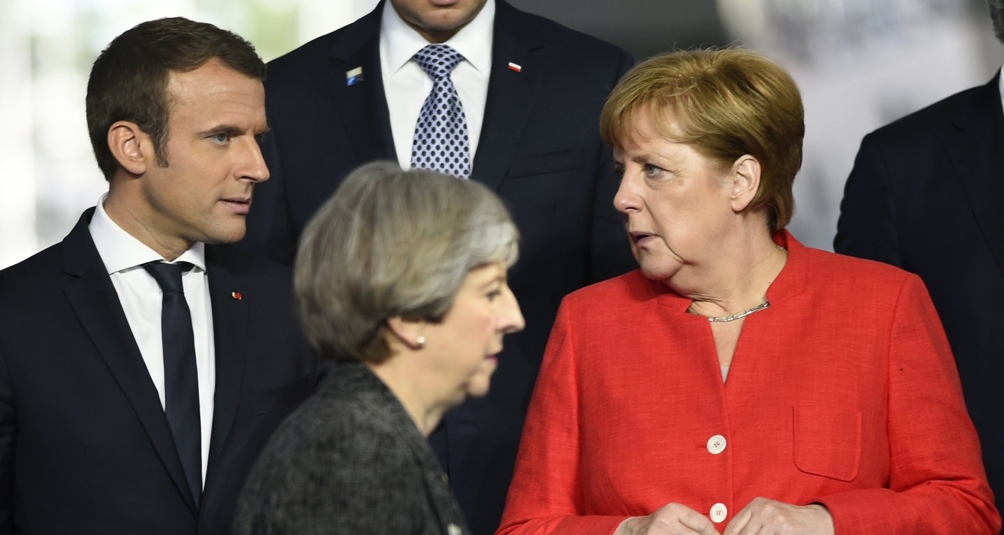 Britain's Theresa May, French President Emmanuel Macron and German Chancellor Angela Merkel (Eric Vidal/Pool Photo via AP)