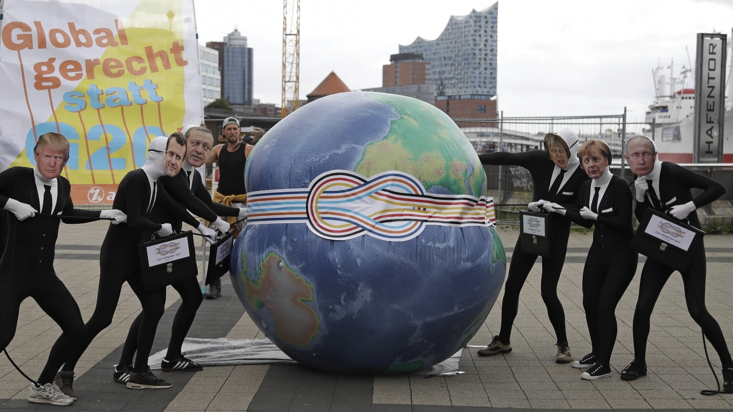 Anti-globalization demonstrators protest austerity in Hamburg ahead of G20 summit (AP Photo/Matthias Schrader)