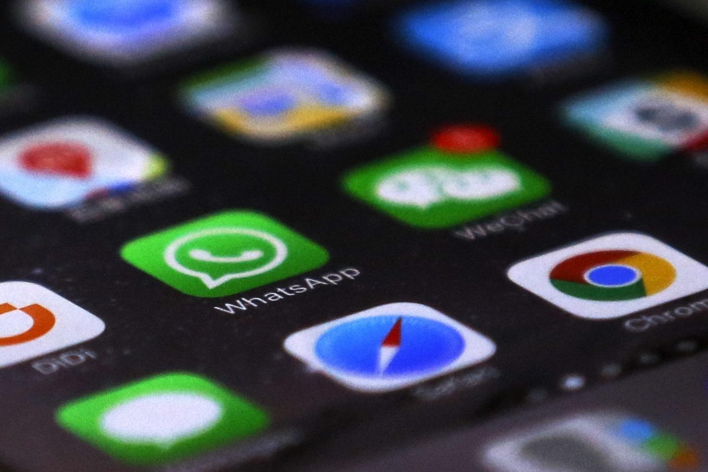 WhatsApp recently set limits on the number of people that a message can be forwarded to: five people in India and 20 everywhere else. (AP Photo/Andy Wong)
