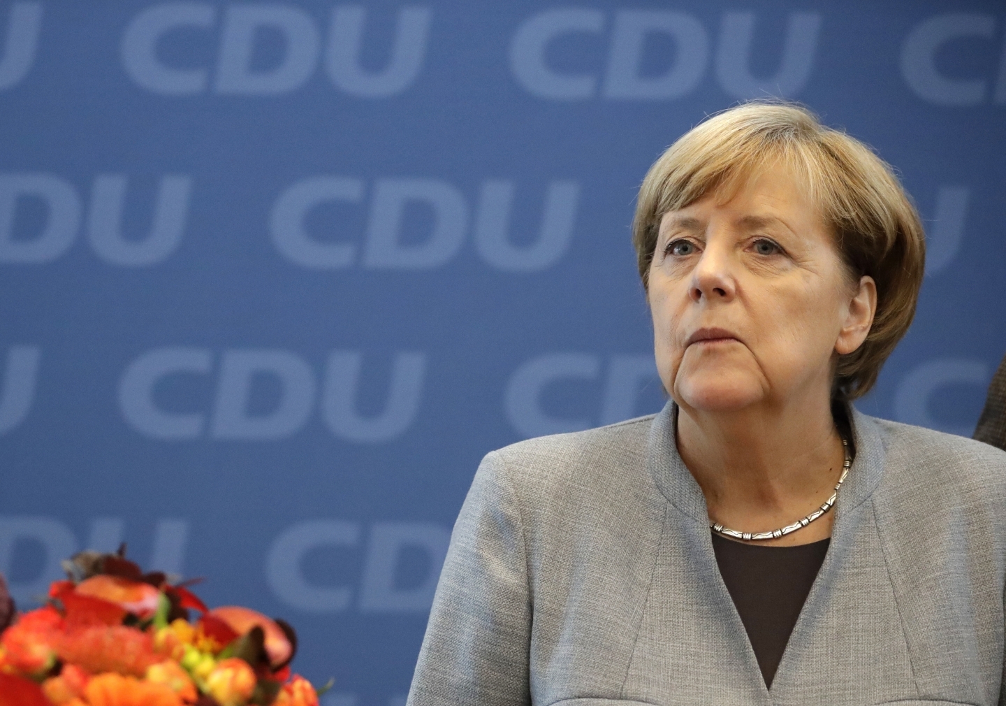 German Chancellor Angela Merkel looks on prior to a meeting of the CDU in Berlin. (AP Photo/Matthias Schrader)