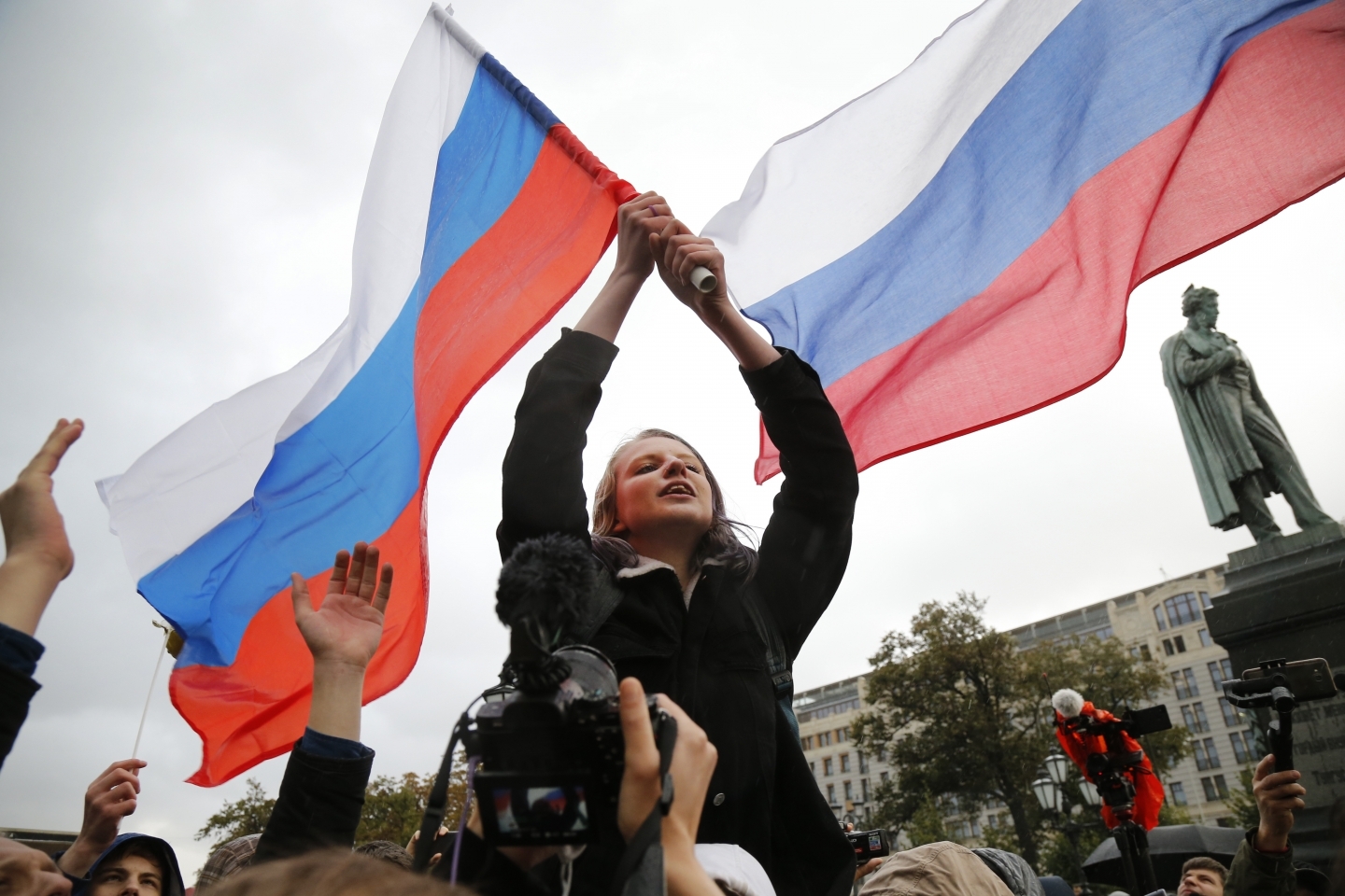 Demonstrators shout slogans and wave Russian flags during an opposition rally in Moscow, Russia on Oct. 7, 2017. (AP Photo/Alexander Zemlianichenko)