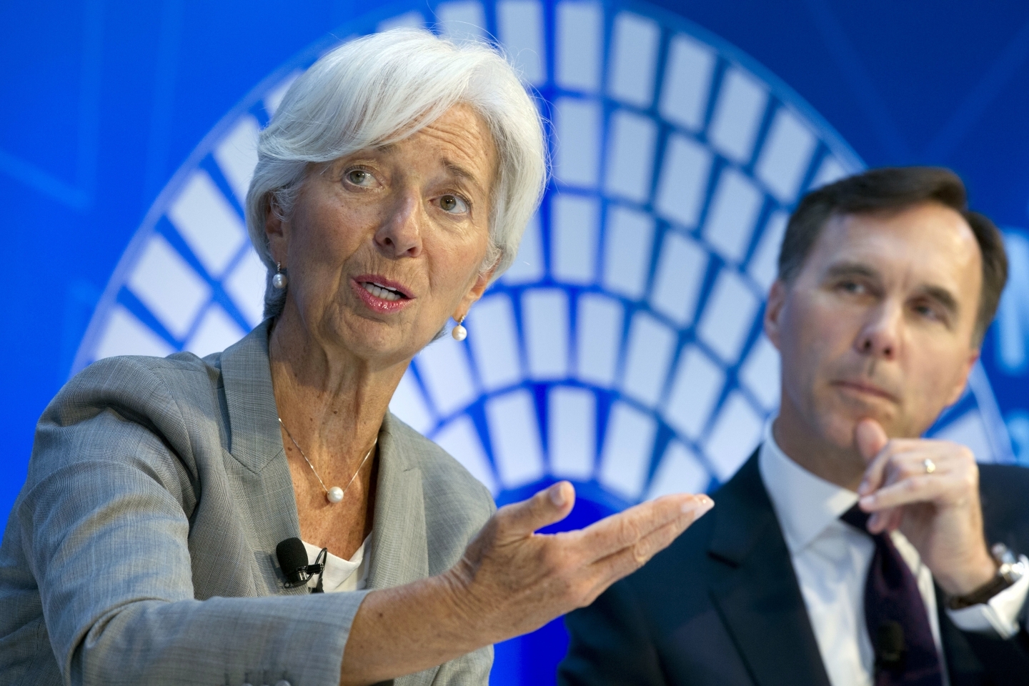 IMF Managing Director Christine Lagarde and Canada Finance Minister William Morneau at the IMF/World Bank meetings in Washington, Thursday, Oct. 12, 2017. (AP Photo/Jose Luis Magana)