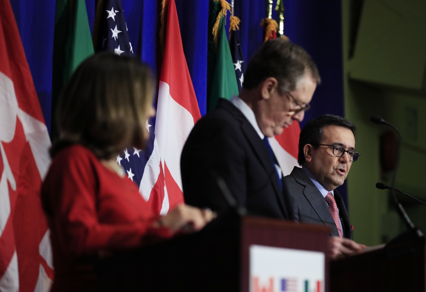 Chrystia Freeland, Robert Lighthizer and Ildefonso Guajardo Villarreal give a trilateral statement during an early round of NAFTA talks. (AP Photo/Manuel Balce Ceneta)