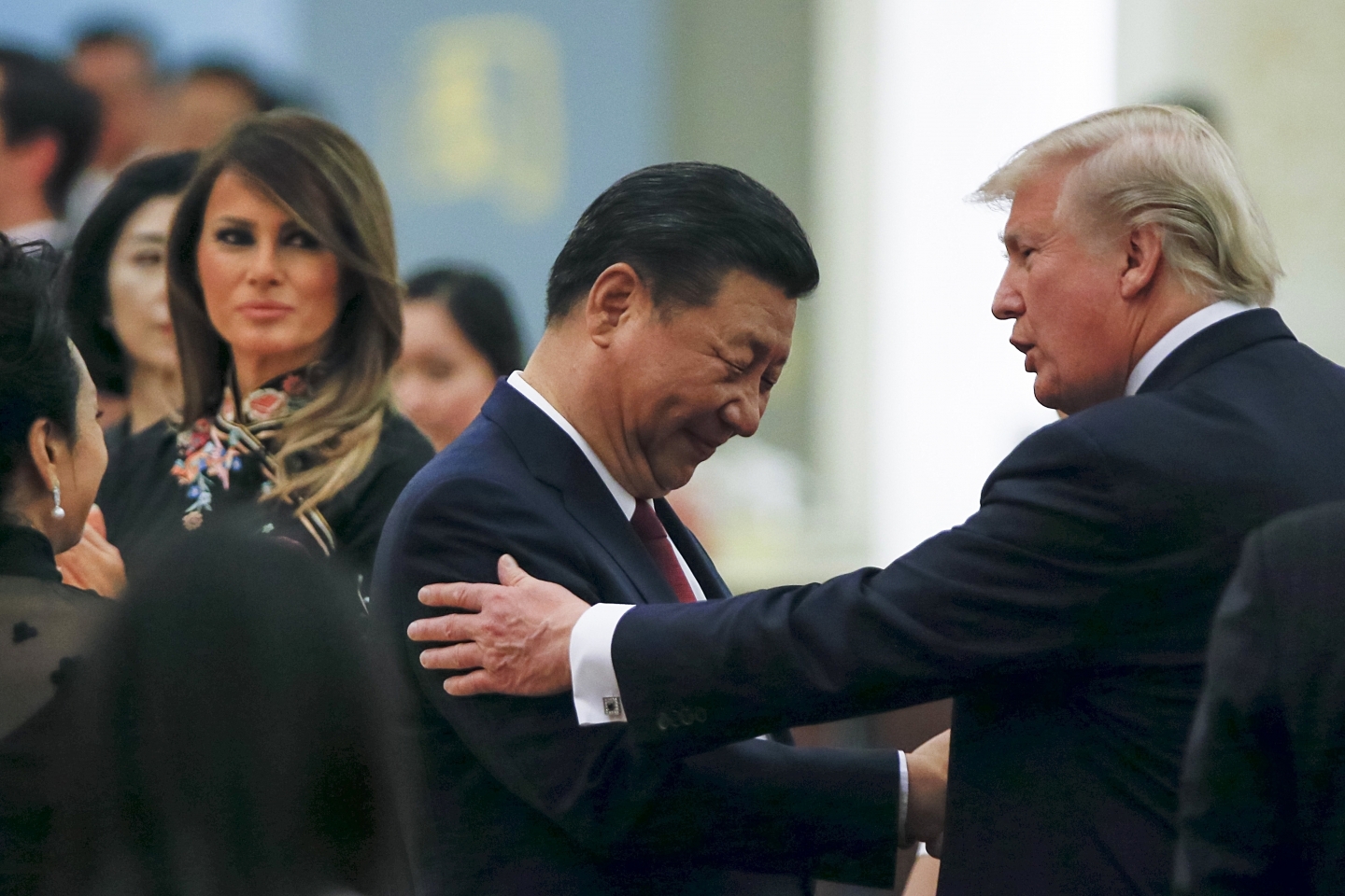 China's President Xi Jinping and President Donald Trump and first lady Melania Trump attend a state dinner at the Great Hall of the People in Beijing, China on November 9, 2017. (Thomas Peter/Pool Photo via AP)