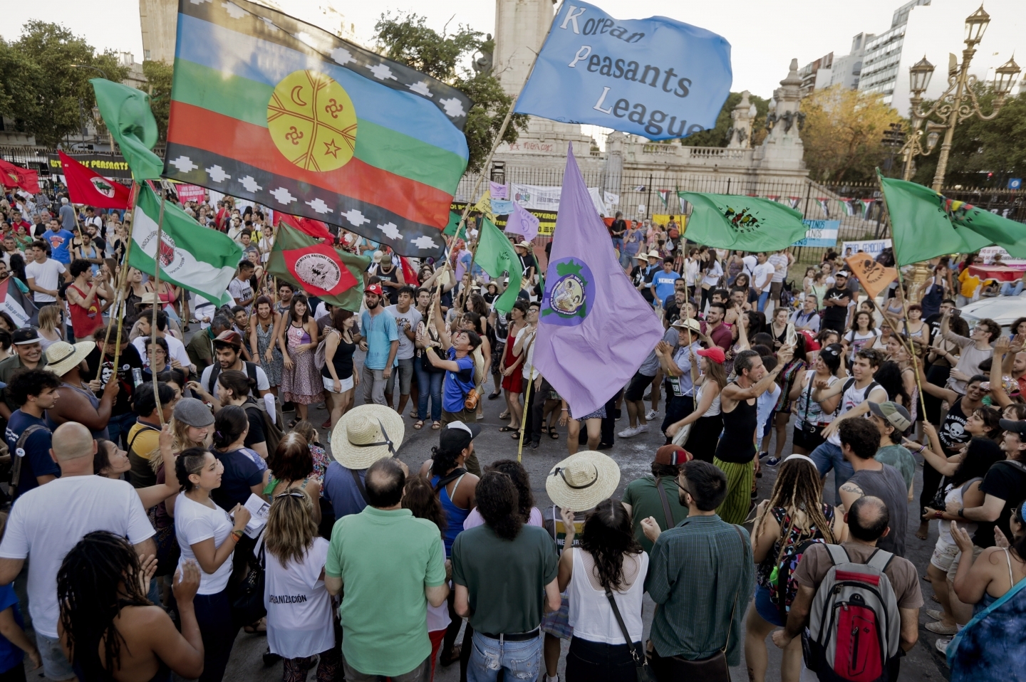 Activists from grassroots organizations chant slogans against free trade and the World Trade Organization conference, in Buenos Aires, Argentina. (AP Photo/Victor R. Caivano)