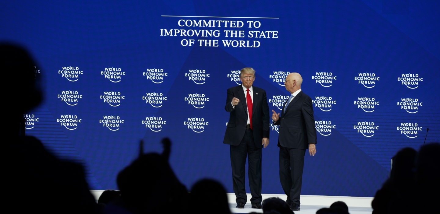 President Donald Trump stands with World Economic Forum's Klaus Schwab after delivering a speech, on January 26, 2018, in Davos. (AP Photo/Evan Vucci)