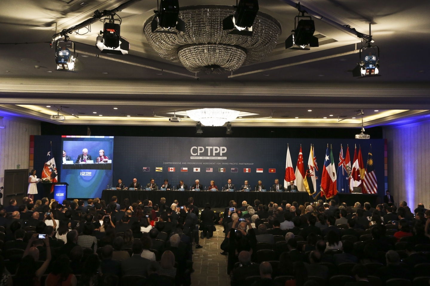 Representatives from 11 countries take part in the Comprehensive and Progressive Agreement for Trans-Pacific Partnership signing ceremony on March 8, 2018. (AP Photo/Esteban Felix)