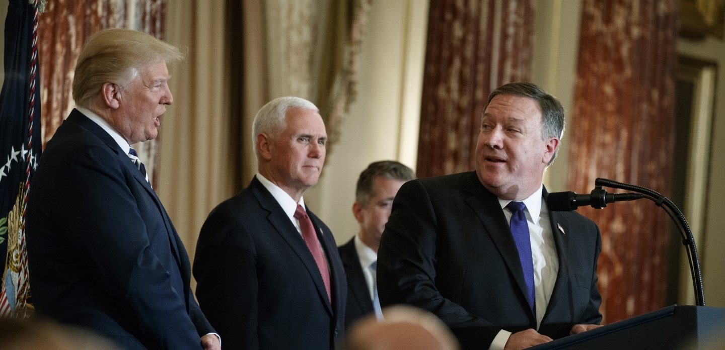 President Trump and Vice President Pence listen as Secretary of State Mike Pompeo speaks during a ceremonial swearing in on May 2 in Washington. (AP Photo/Evan Vucci)