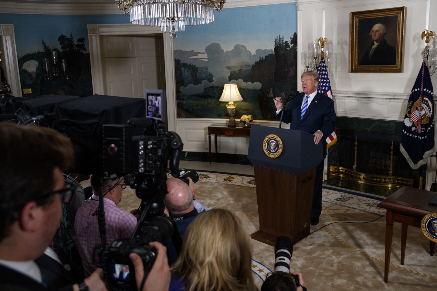 President Donald Trump delivers a statement on the Iran nuclear deal from the Diplomatic Reception Room of the White House on May 8, 2018 in Washington. (AP Photo/Evan Vucci)