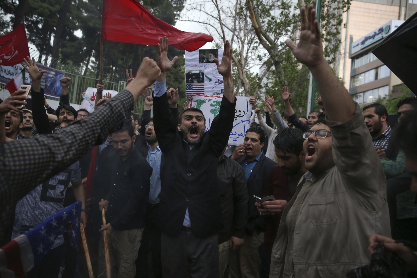 Iraninan demonstrators chant slogans following President Donald Trump's decision to pull out of the nuclear deal and renew sanctions on Iran (AP Photo/Vahid Salemi)