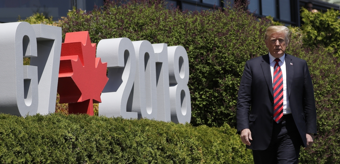 President Donald Trump arrives to participate in the G7 Summit welcome ceremony, on June 8, 2018, in Charlevoix, Canada. (AP Photo/Evan Vucci)