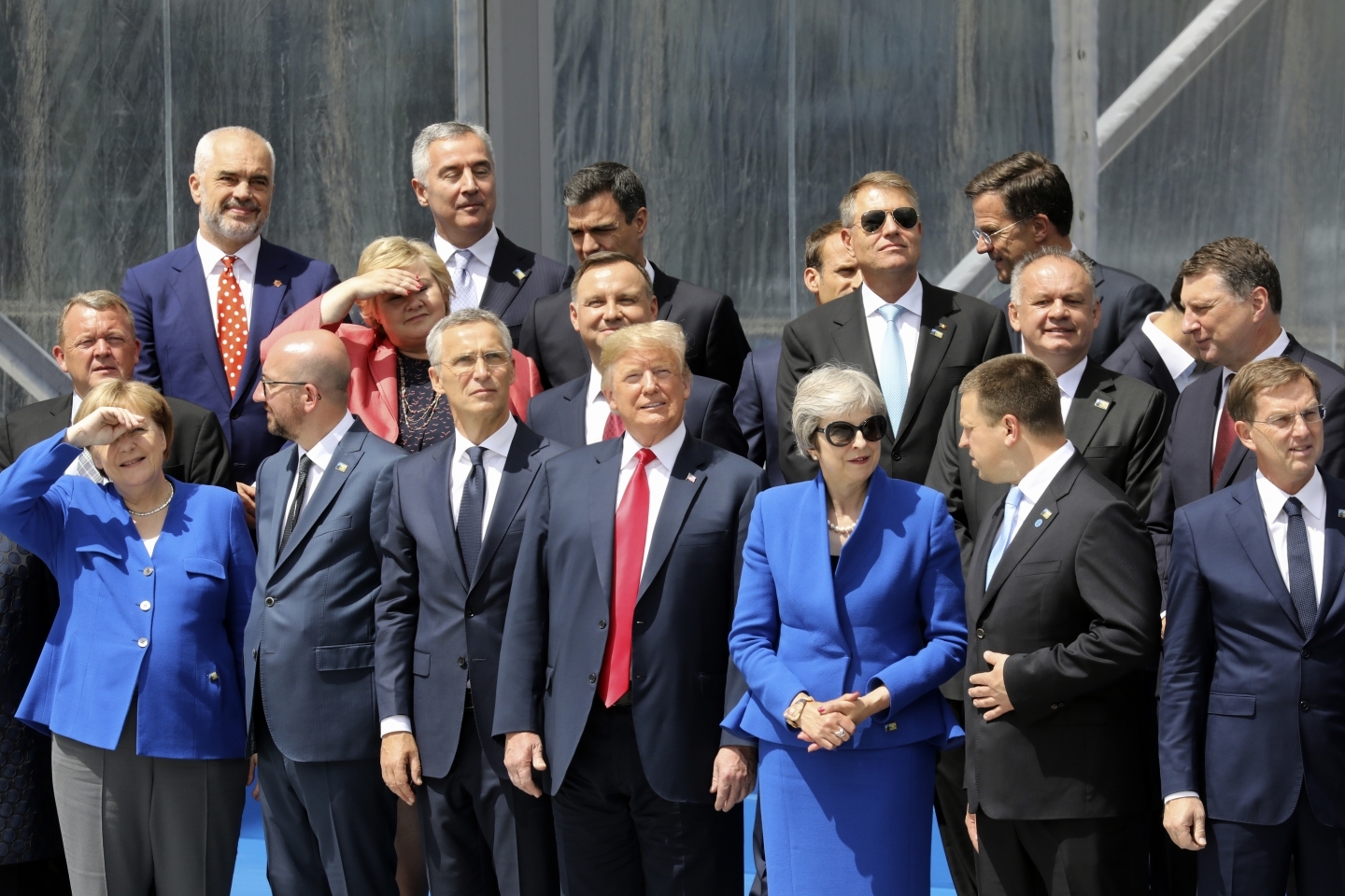 Global leaders pose for a family picture ahead of the opening ceremony of the NATO summit in Brussels on July 11, 2018. (Ludovic Marin, Pool via AP)