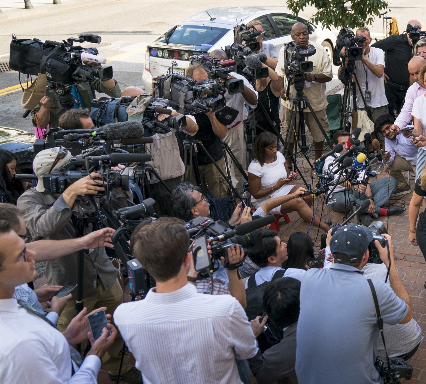 Reporters at the Office of the United States Trade Representative in Washington. (AP Photo/Andrew Harnik)