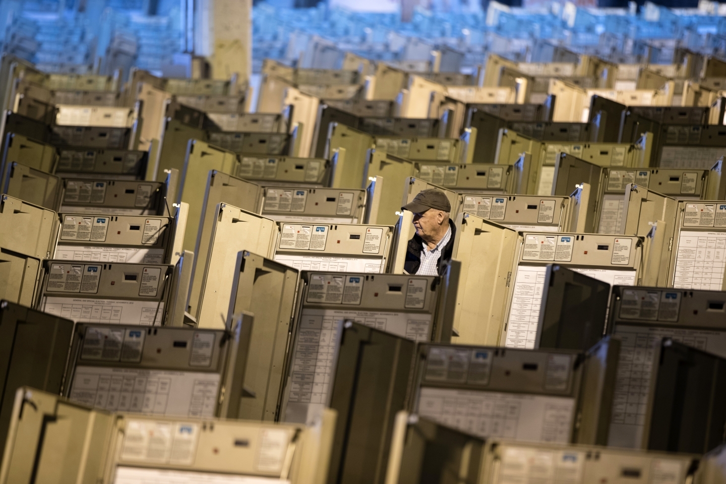A technician works to prepare voting machines for voters in advance of the 2016 US presidential election. (AP Photo/Matt Rourke)