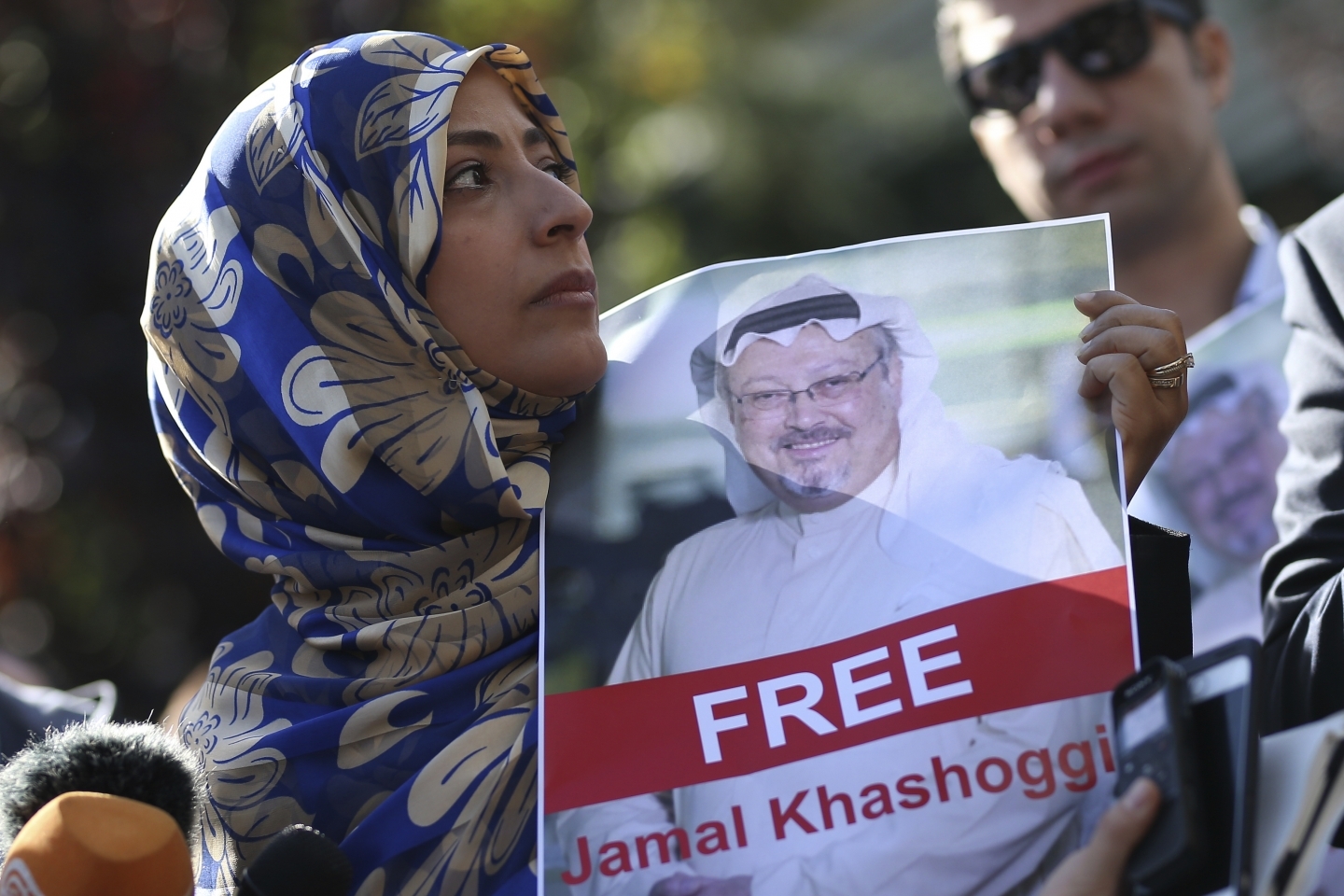 Tawakkol Karman, the Nobel Peace Prize laureate for 2011, holds a picture of Saudi writer Jamal Khashoggi as she speaks to journalists near the Saudi Arabia consulate, in Istanbul, Turkey. (AP Photo/Emrah Gurel, File)