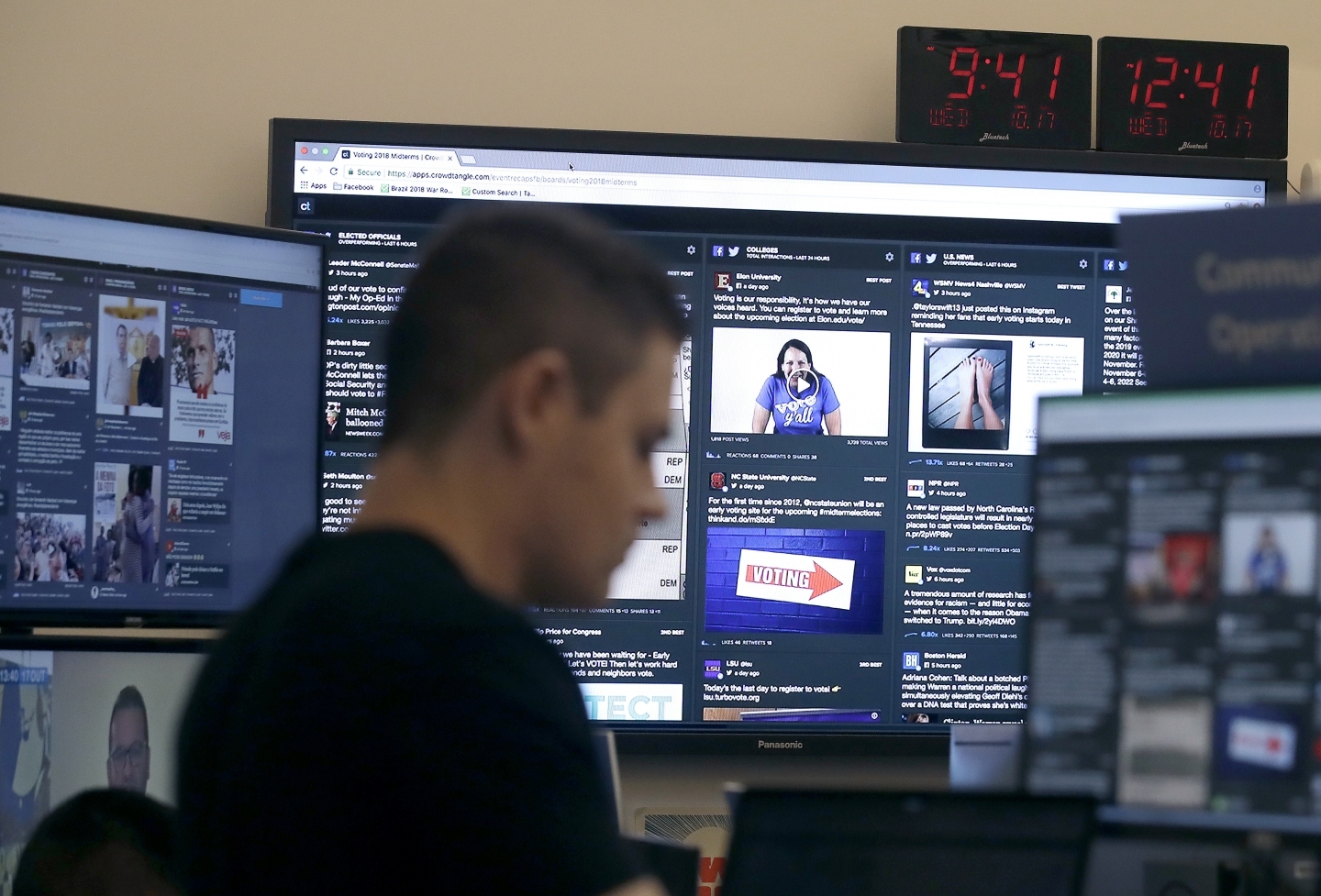 A Facebook staff person monitors election-related content. (AP Photo/Jeff Chiu)