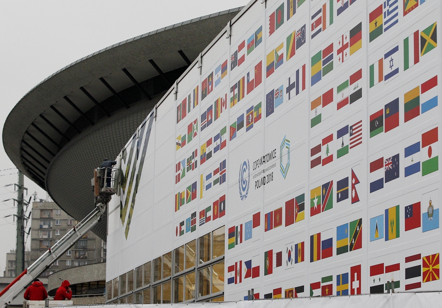 Workers decorate the venue of the global climate summit that will be held at the site of a closed coal mine in Katowice, Poland. (AP Photo/Czarek Sokolowski)