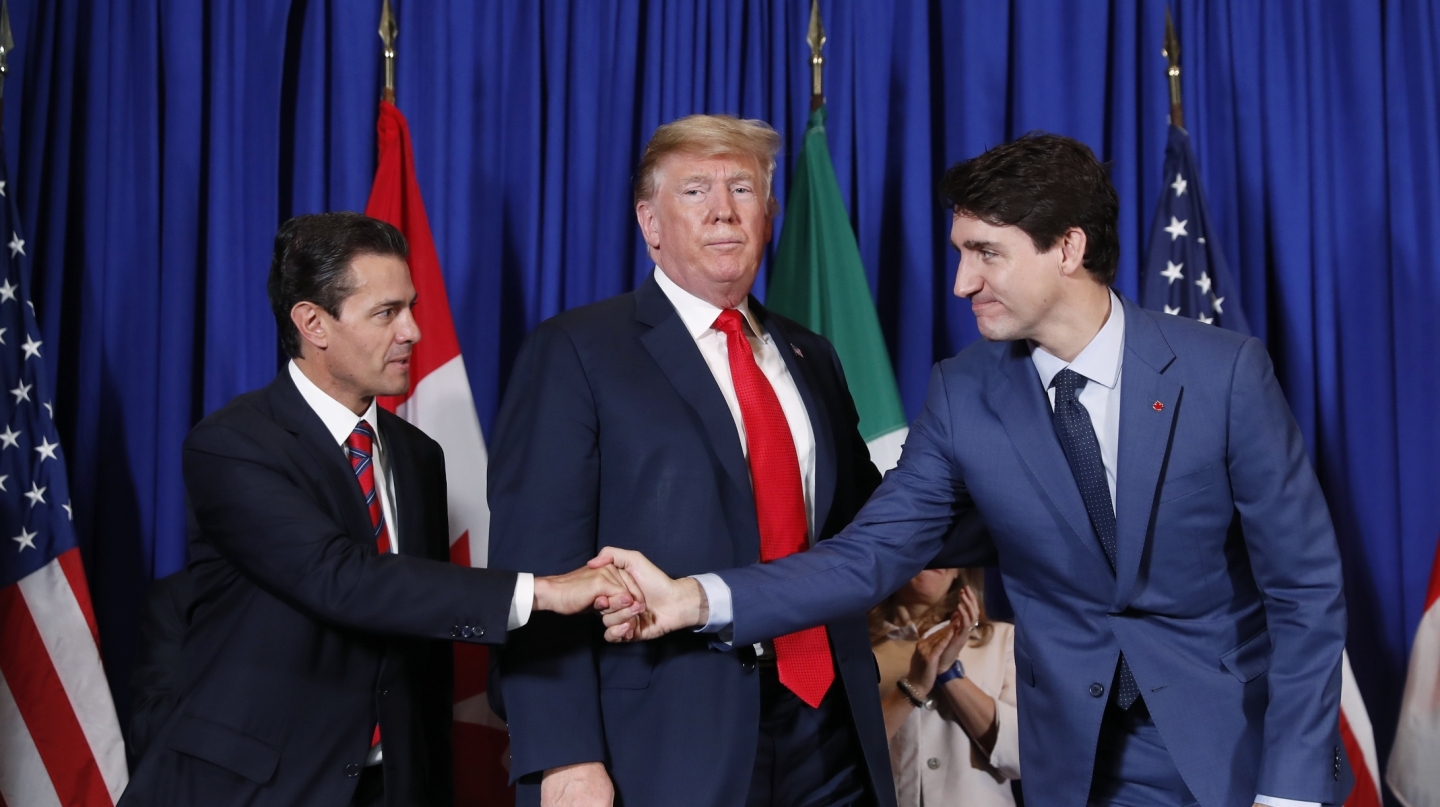 President Donald Trump, Prime Minister Justin Trudeau and President Enrique Pena Nieto participate in the USMCA signing ceremony on November 30, 2018 in Buenos Aires, Argentina. (AP Photo/Pablo Martinez Monsivais)