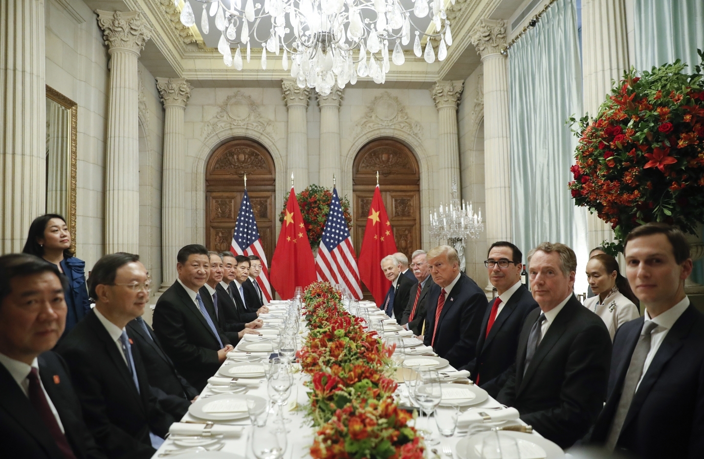 US President Donald Trump with China's President Xi Jinping and members of their official delegations during their bilateral meeting at the G20 Summit, December 1, 2018 in Buenos Aires, Argentina. (AP Photo/Pablo Martinez Monsivais)