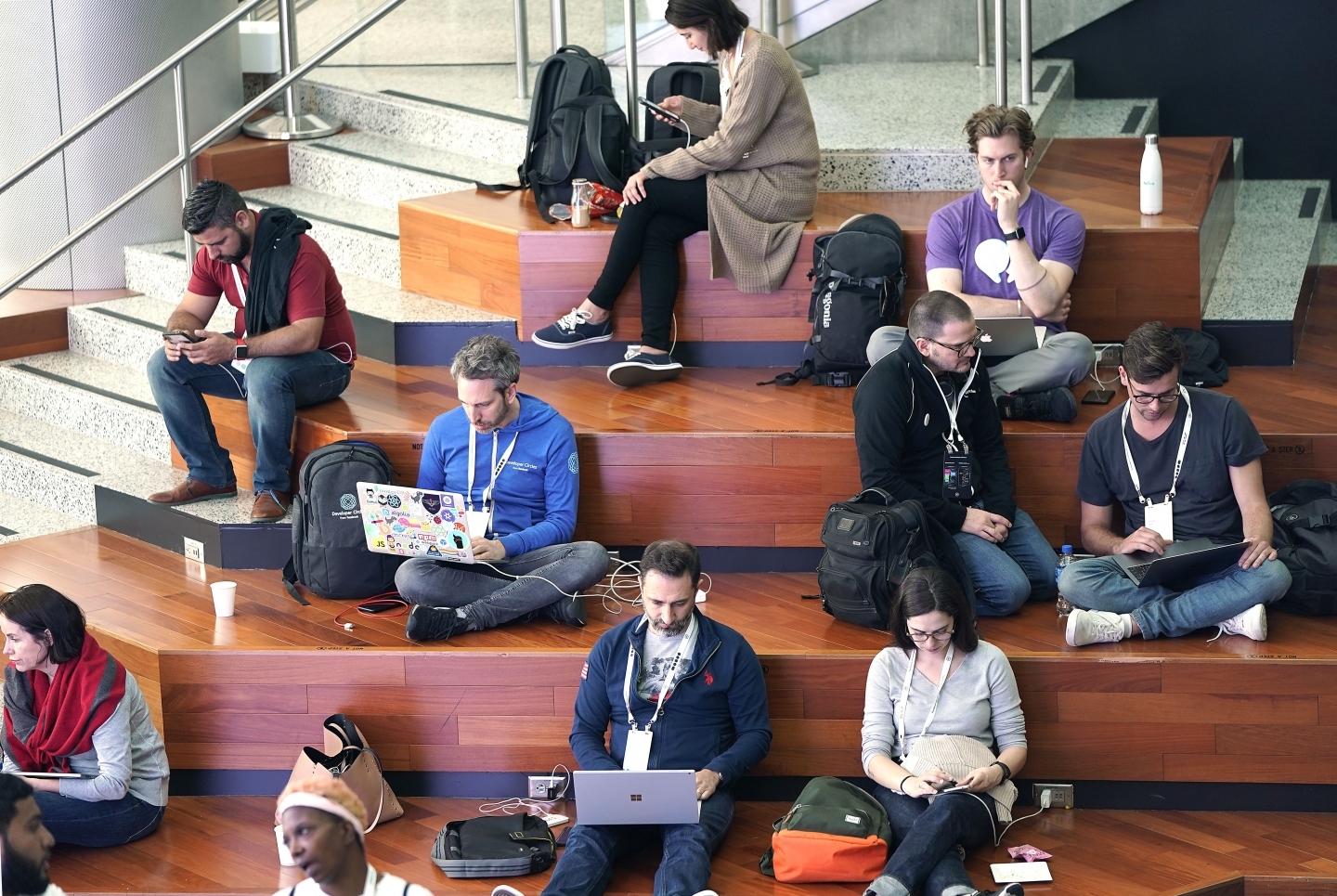 Attendees work on their computers at Facebook's developer conference on April 30, 2019, in San Jose. (AP Photo/Tony Avelar )