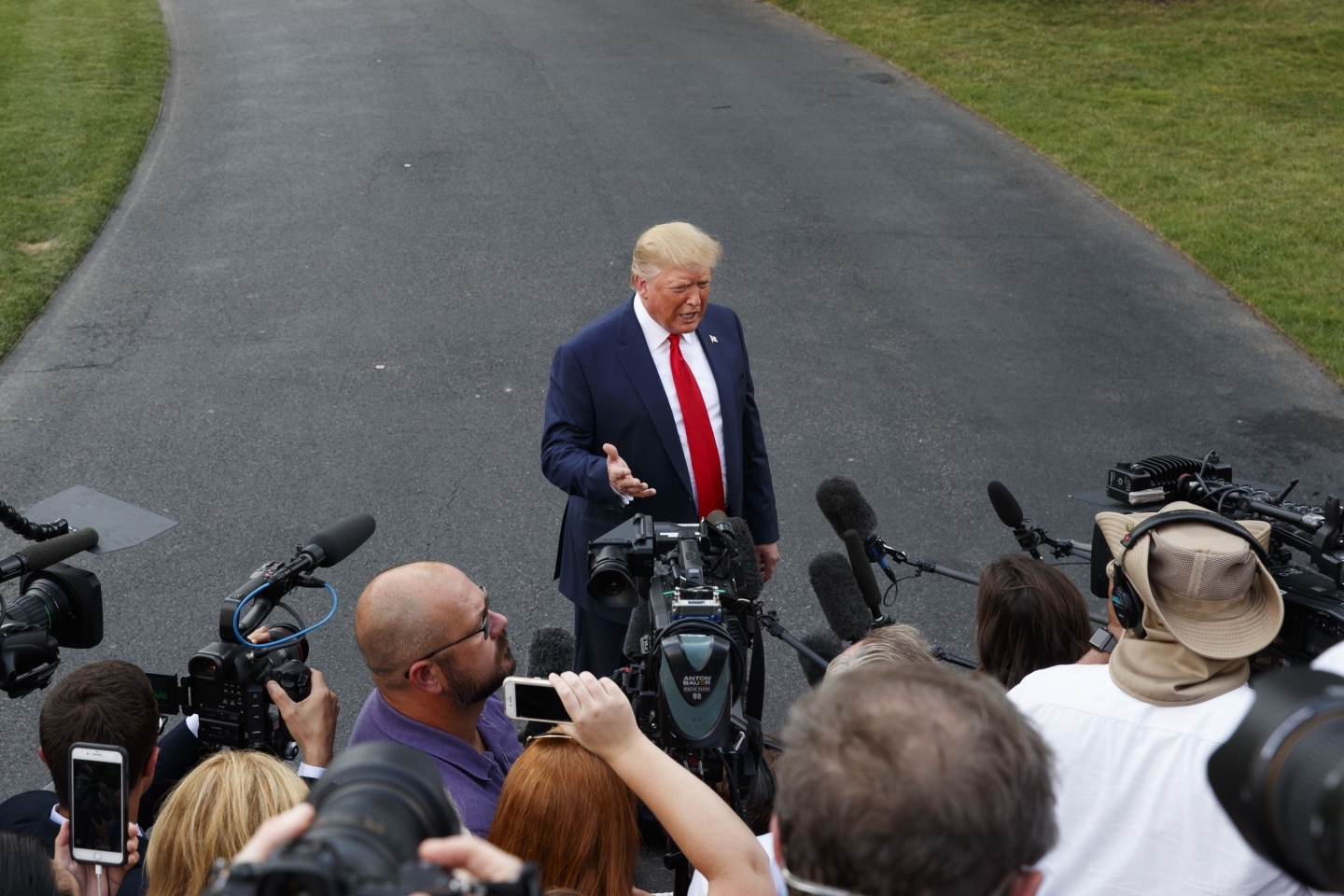 President Donald Trump speaks to media as he leaves the White House in Washington on August 1, 2019. (AP Photo/Carolyn Kaster)
