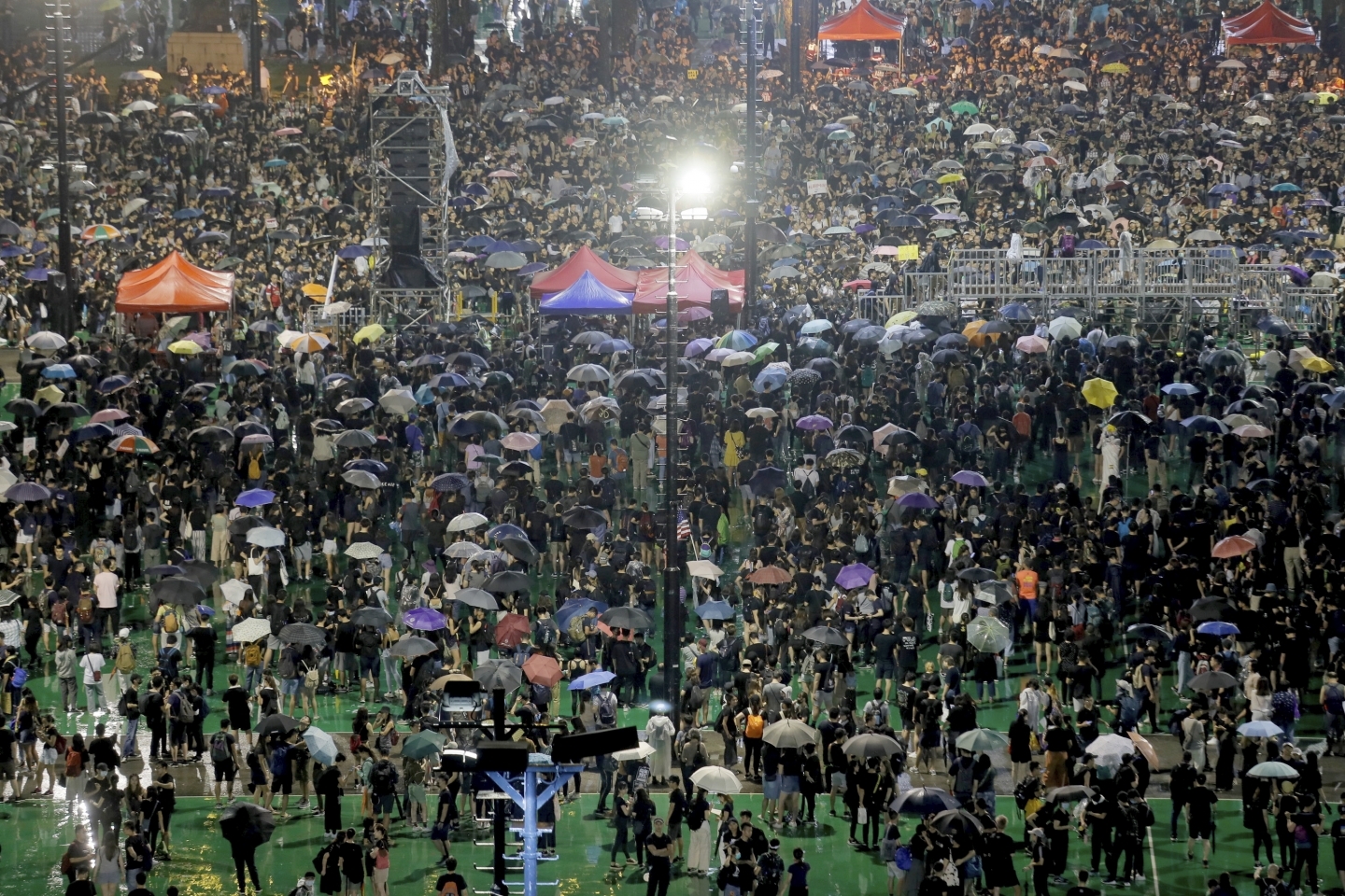 Protesters attend a rally at Victoria Park in Hong Kong on August 18, 2019. (AP Photo/Kin Cheung)