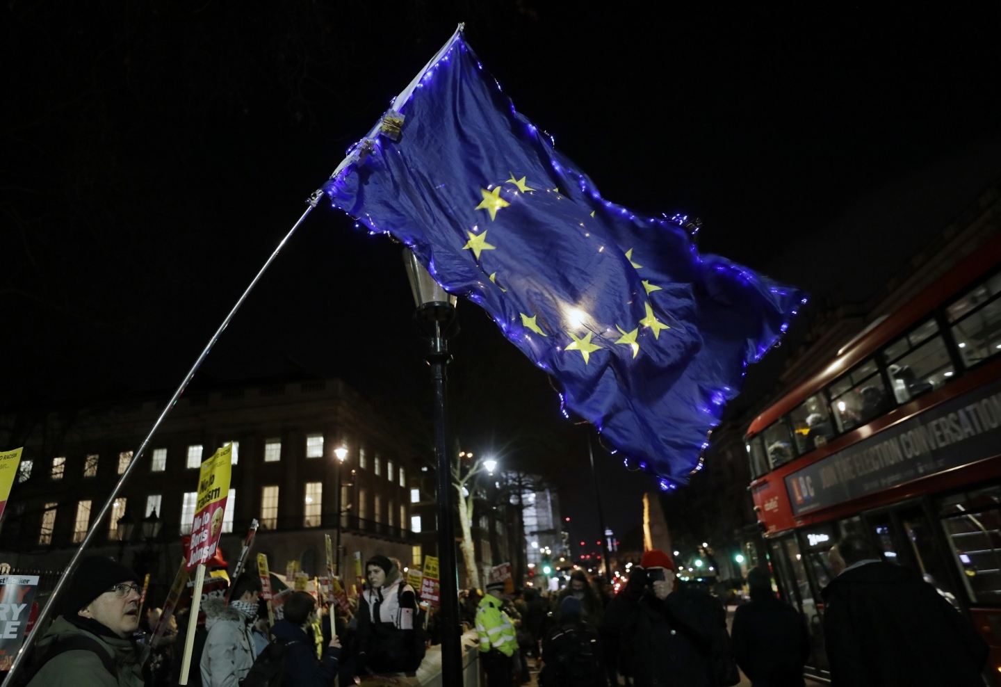 People attend an anti-Boris Johnson demonstration in central London on December 13, 2019. AP Photo/Kirsty Wigglesworth)