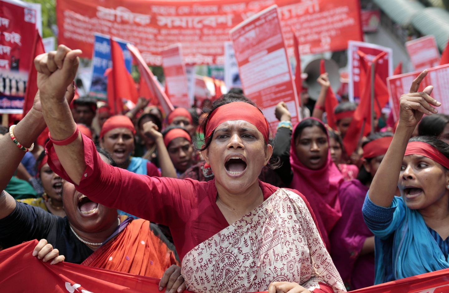 Garment workers and activists shout slogans during a May Day rally in Dhaka, Bangladesh. (AP Photo/A.M. Ahad)