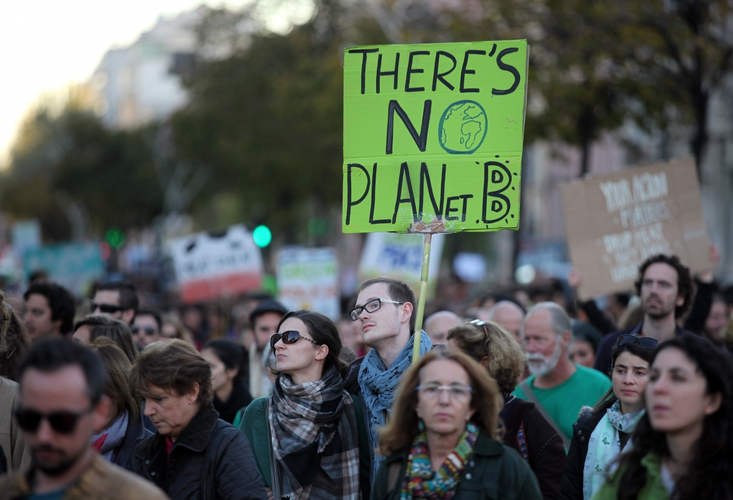 Rallies were organized around the world on Sunday, calling on all government leaders to halt climate change on the eve of a major conference in Paris. (AP Photo/Armando Franca)