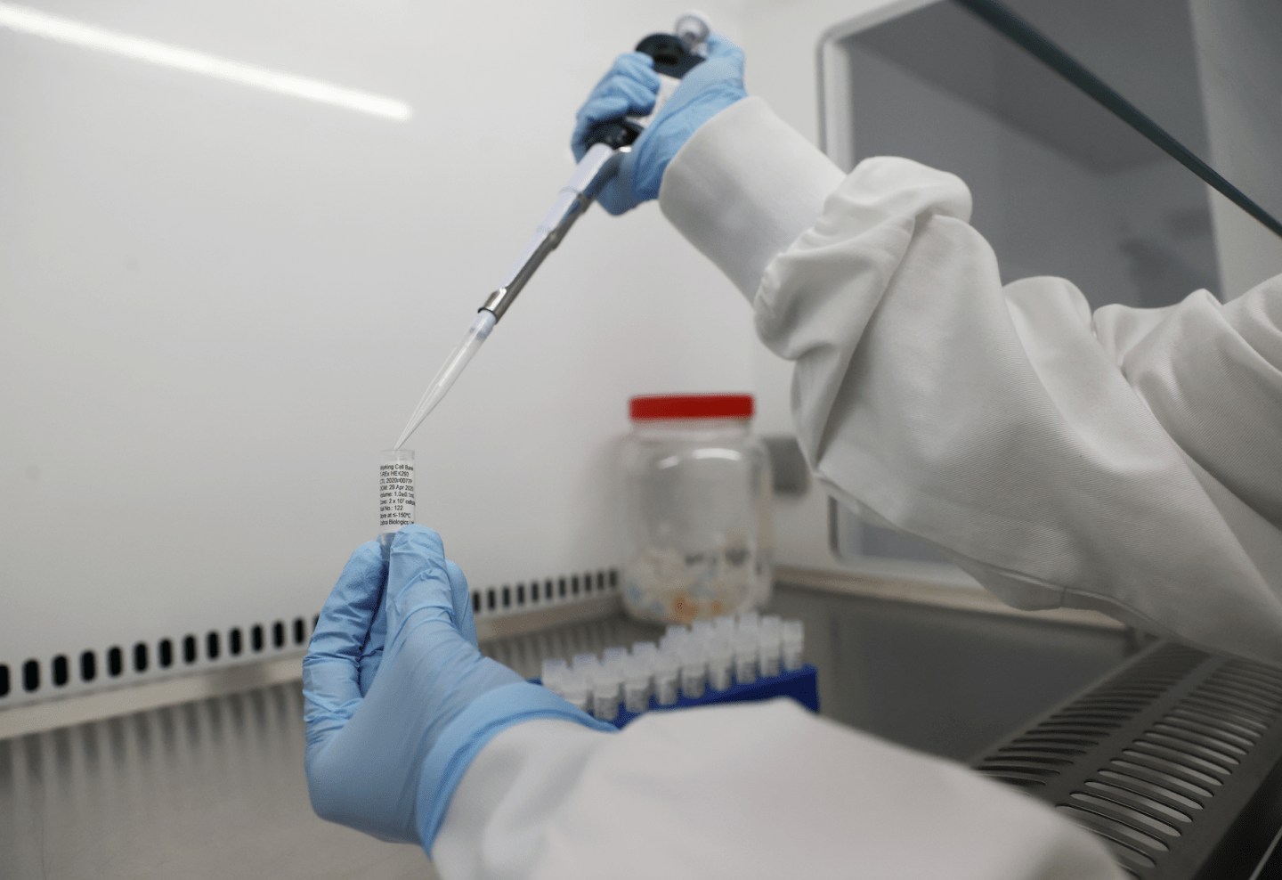 Scientist in a laboratory seen working on a potential vaccine for COVID-19 on April 30, 2020. REUTERS/Carl Recine