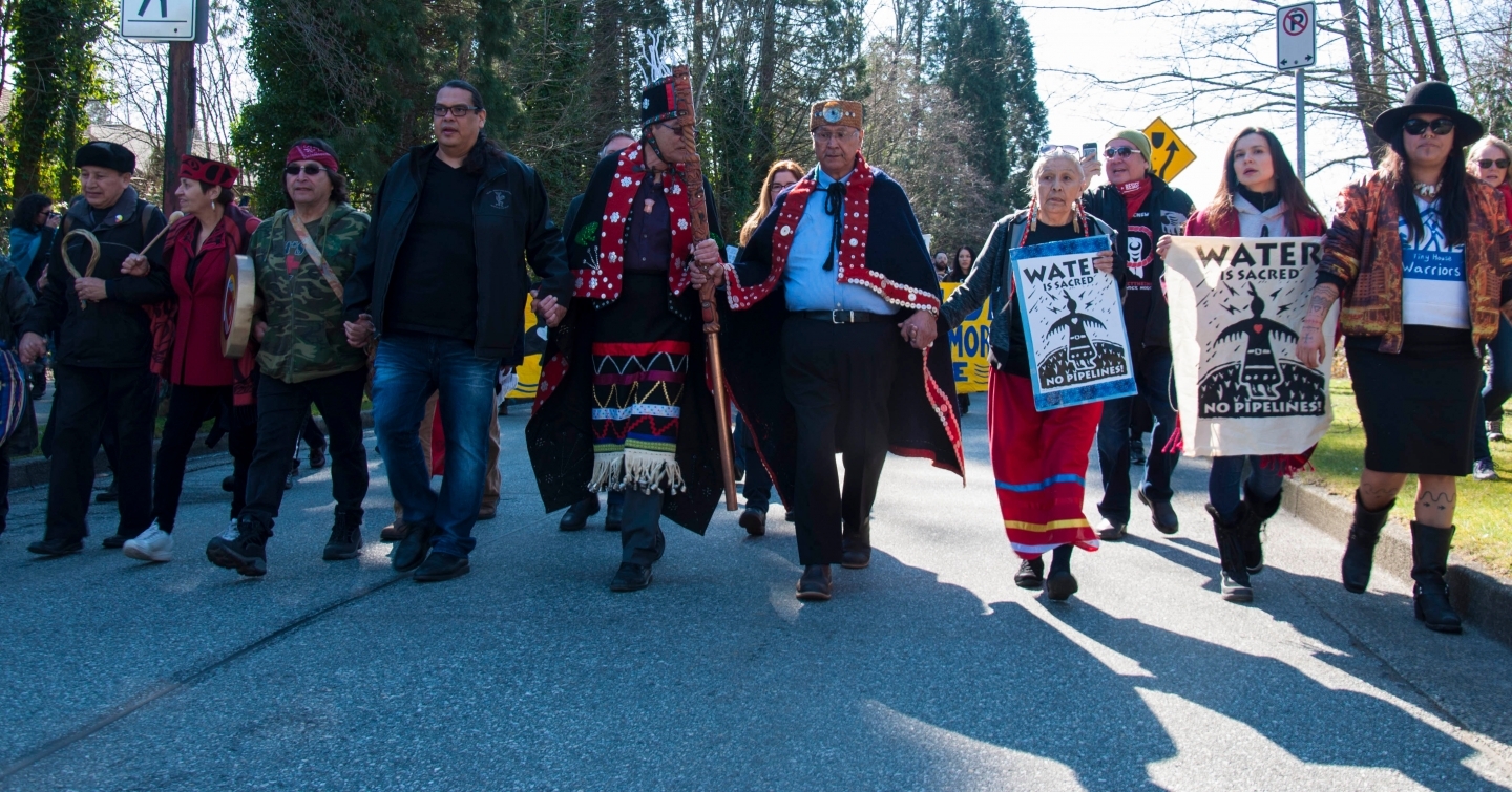 Demonstrators in Burnaby, British Columbia take part in the Protect the Inlet march against the Trans Mountain pipeline expansion. (Shutterstock)