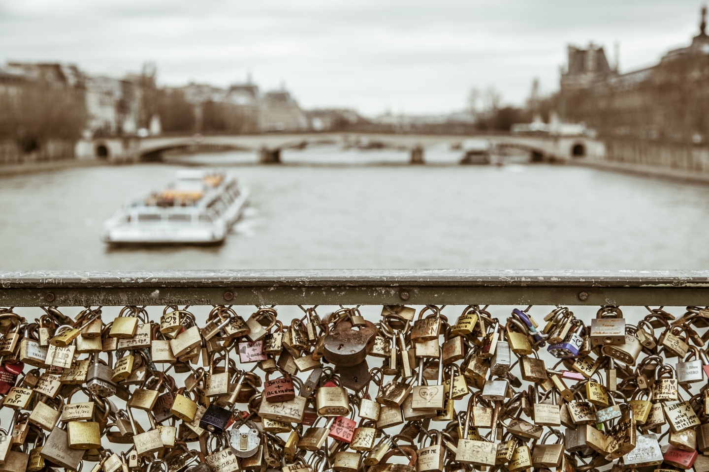 Love locks attached to the railing of a bridge in Paris (Shutterstock)