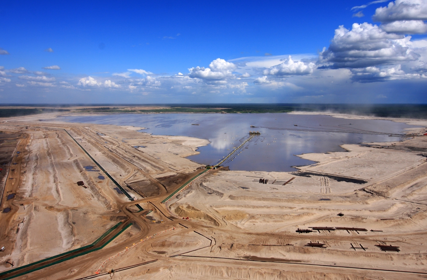 According to a complaint filed with the Commission for Environmental Cooperation, millions of litres of tailings ponds water are leaking into the Athabasca River basin. (Shutterstock)