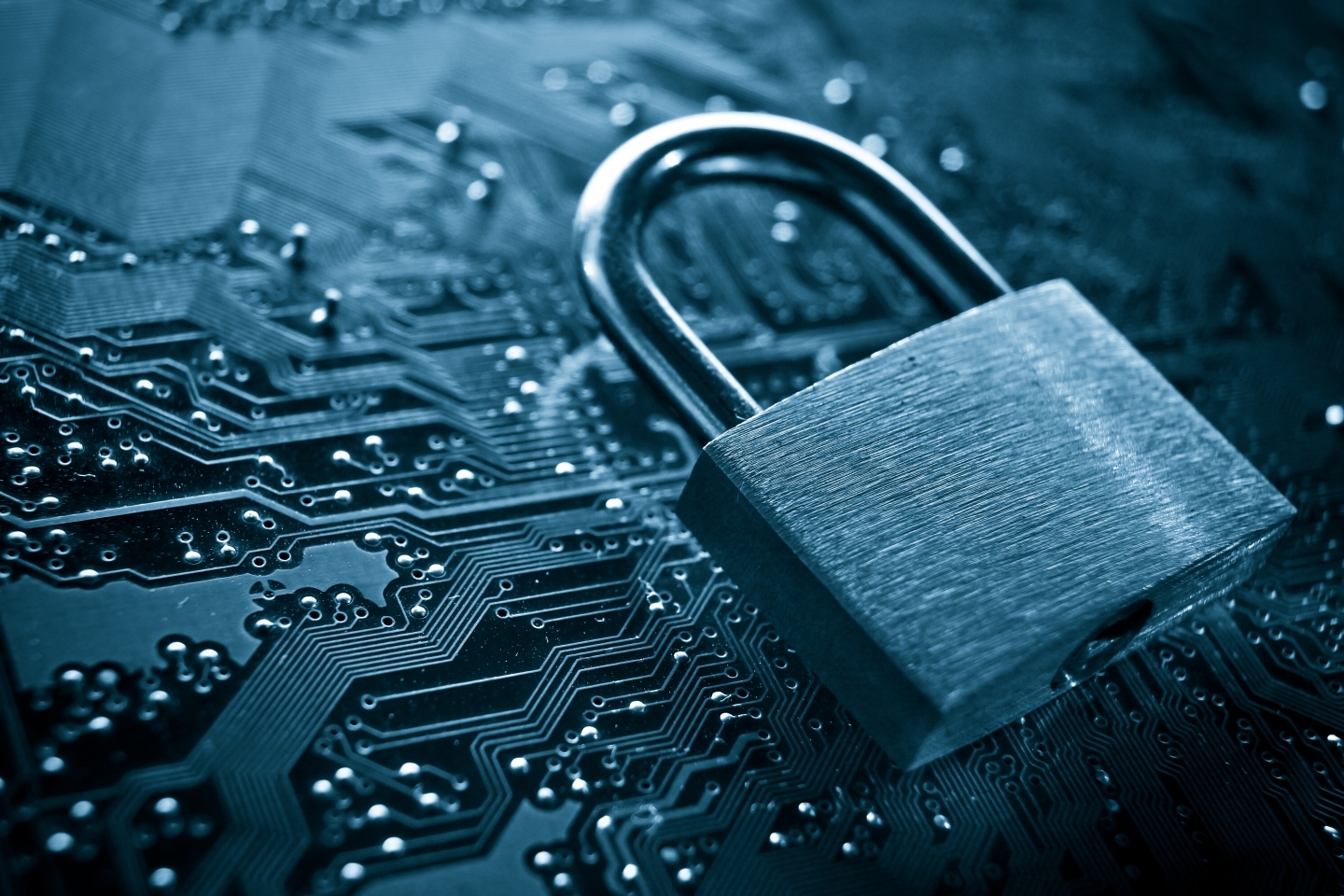 Security lock on computer circuit board.