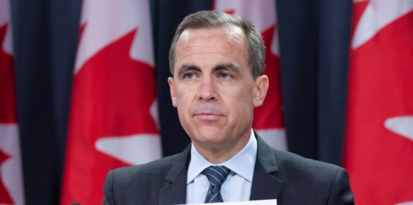 Bank of Canada Governor Mark Carney speaks with reporters during a news conference in Ottawa (AP Photo/The Canadian Press, Adrian Wyld).