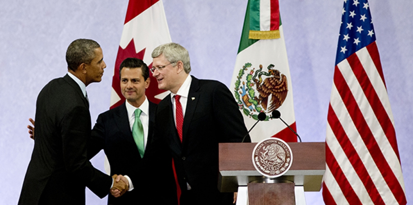 Barack Obama, Enrique Pena Nieto, and Stephen Harper met in Feb. 19, 2014 to highlight the economic cooperation that has grown since NAFTA joined the U.S., Canada and Mexico 20 years ago. (AP Photo/Eduardo Verdugo)