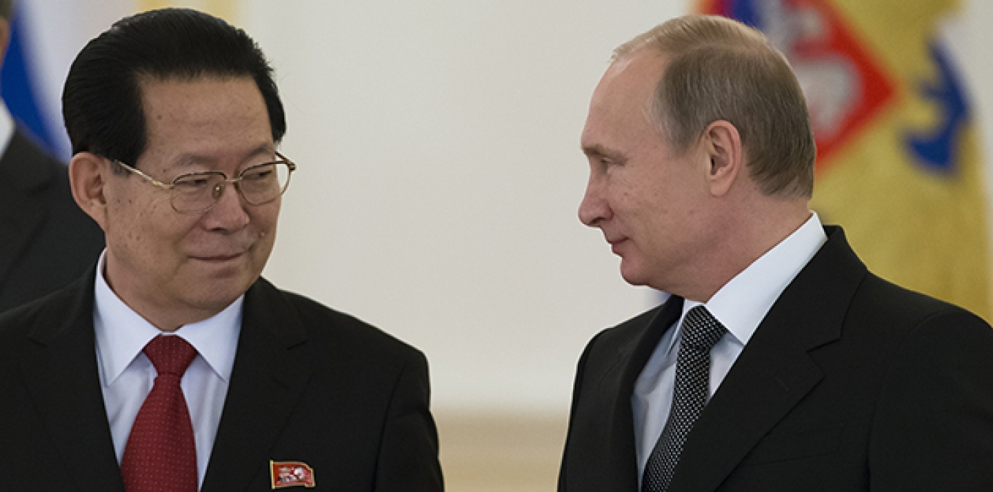 North Korea Republic Ambassador Kim Hyun-joon, and Russian President Vladimir Putin pose for a photo after presenting his credentials in the Kremlin in Moscow, Russia, Wednesday, Nov. 19, 2014. (AP Photo/Alexander Zemlianichenko, pool)