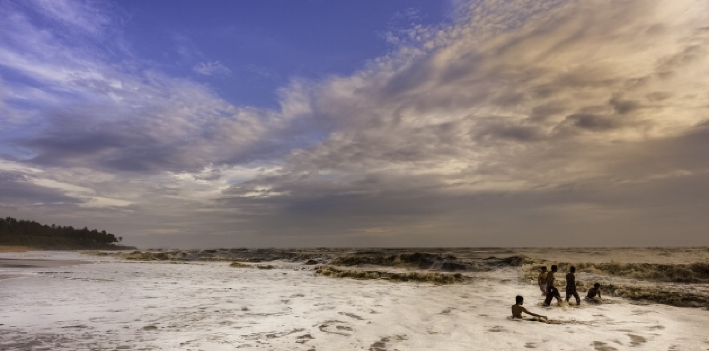 Swimmers at high-tide. (Shutterstock)