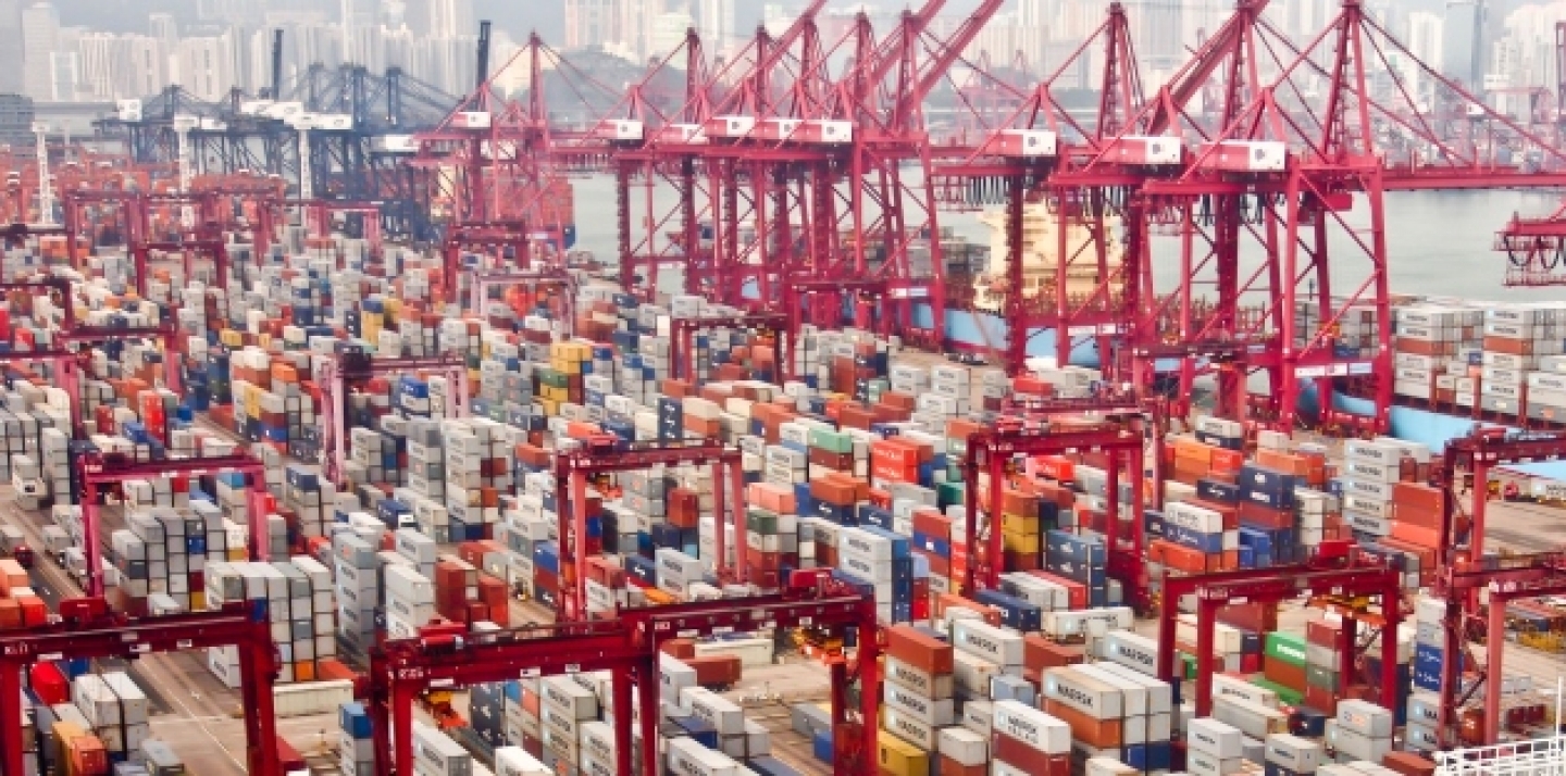 Containers at Hong Kong commercial port on Nov 24, 2012 in Hong Kong, China (Shutterstock)