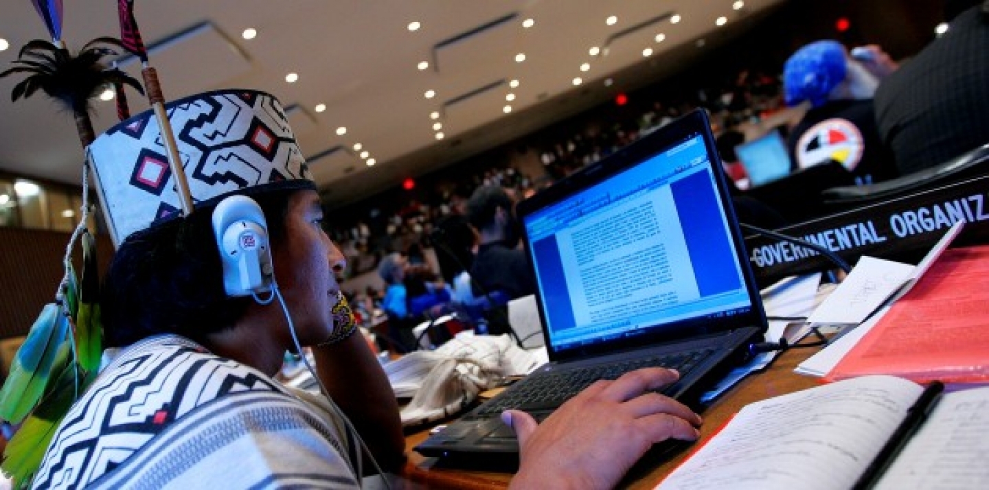 Mandcineru of Brazil, works on a computer during the 7th Session of the Permanent Forum on Indigenous Issues at United Nations headquarters in New York. (AP Photo/Stephen Chernin)